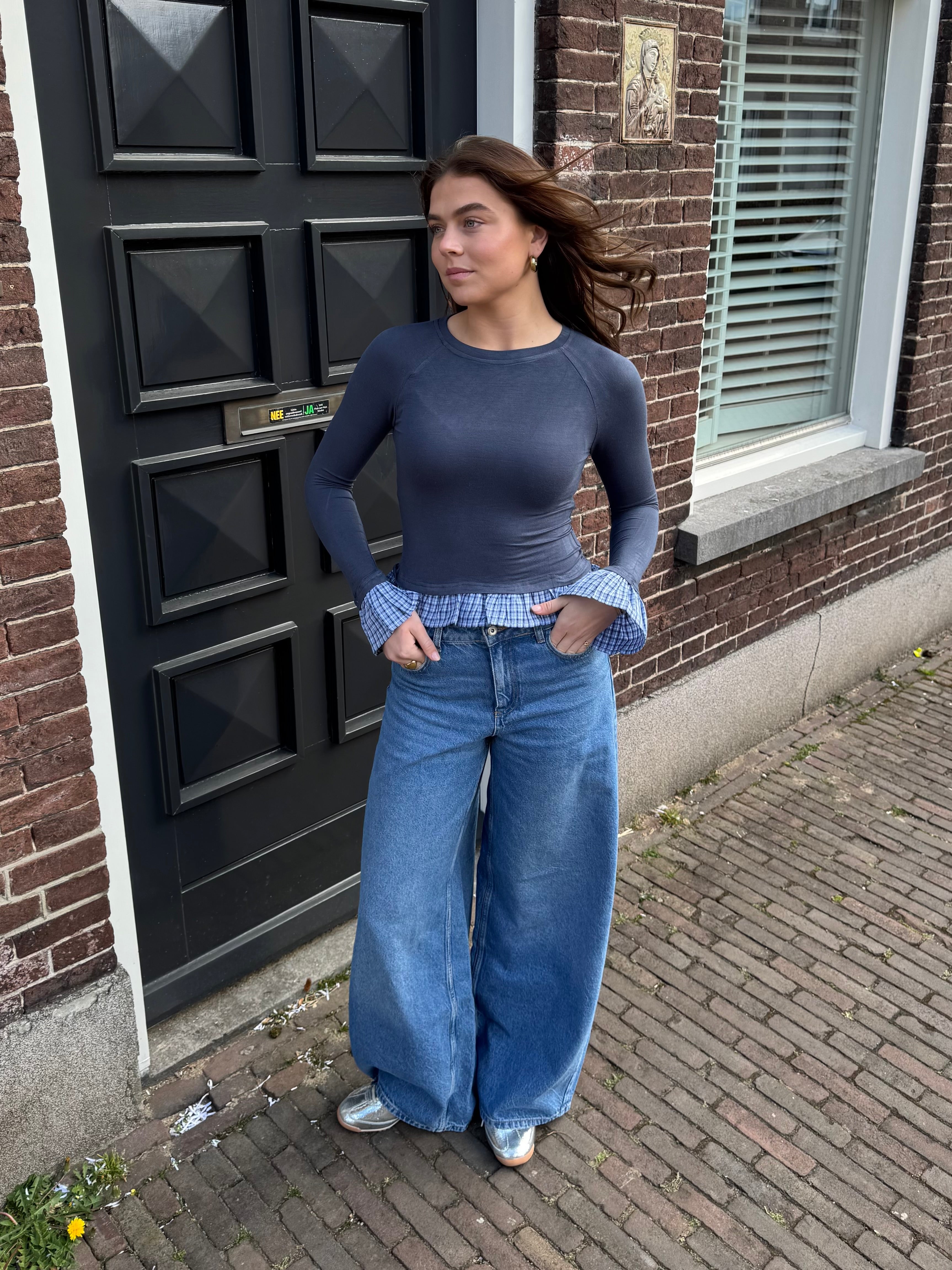 Donkerblauwe top met ruches | Ruffle top met lange mouwen