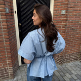 Lichtblauw blouse | Getailleerde blouse met strik